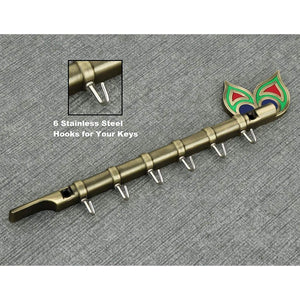 0497 brass flute and peacock key holder wall hanging